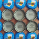 Illustration for article titled These beer bottle caps would like to start a conversation about your prostate